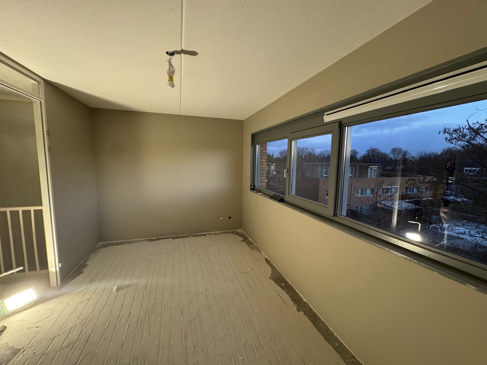 Slaapkamer met spuitplafond