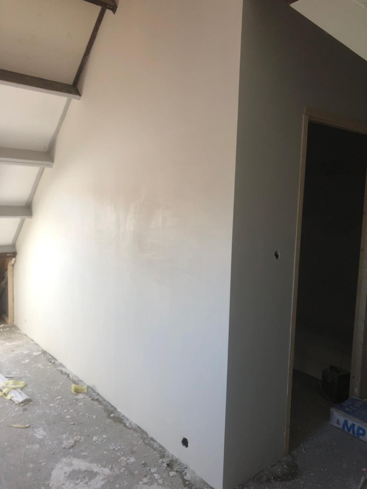 Zolderwand strak afgewerkt